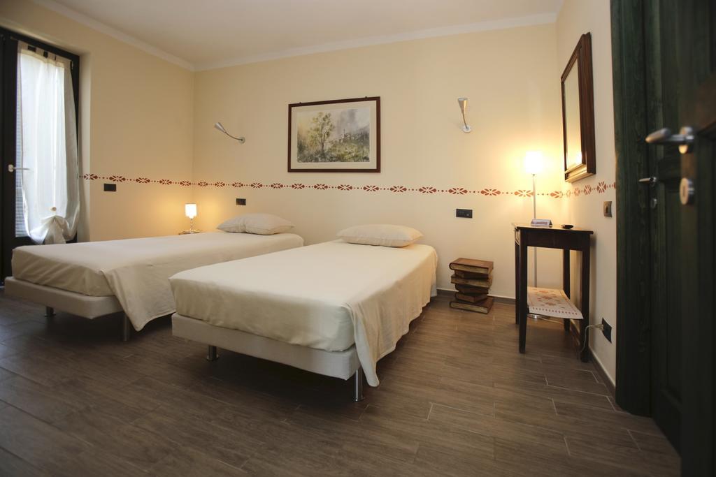 Ospitidelpero Bed and Breakfast Piozzo Værelse billede